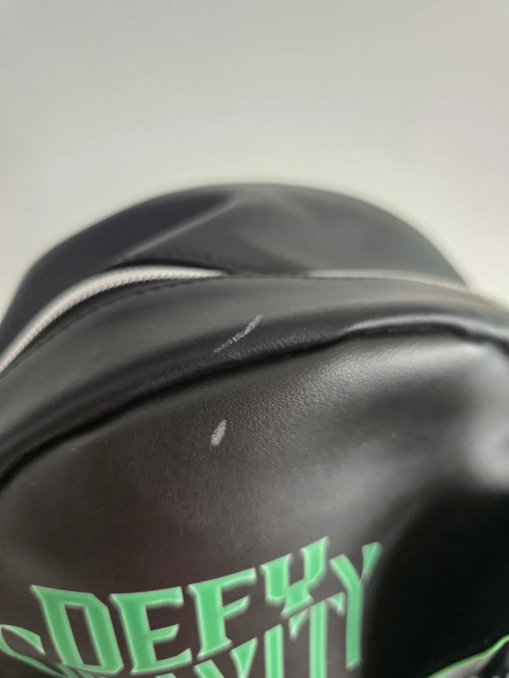 Wicked Defy Black & Green 'Defy Gravity' Men's Backpack with 'Wicked' Coin Pouch